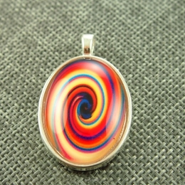 Resin Cabochone in cast with a three dimensional effect, size 40x25mm. 