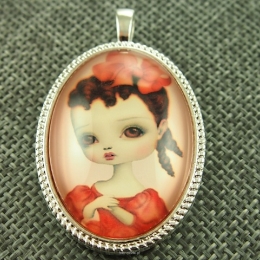 Resin Cabochone in cast with a three dimensional effect, size 47x30mm. 